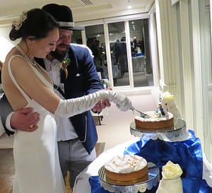 Bride and Groom cutting their cake